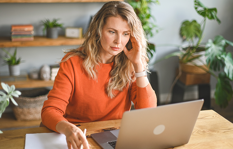 Woman sitting at laptop